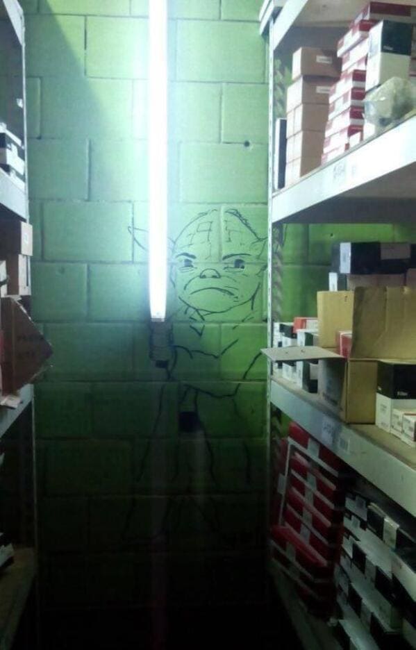 Yoda drawn on wall to make it look like he's holding a tube light, Mildly vandalised, mildly vandalized, funny photos of people who fixed signs, hilarious edits on road signs, funny people who added stuff to passive-aggressive signs, funny pics, lol, fixed it, nailed it